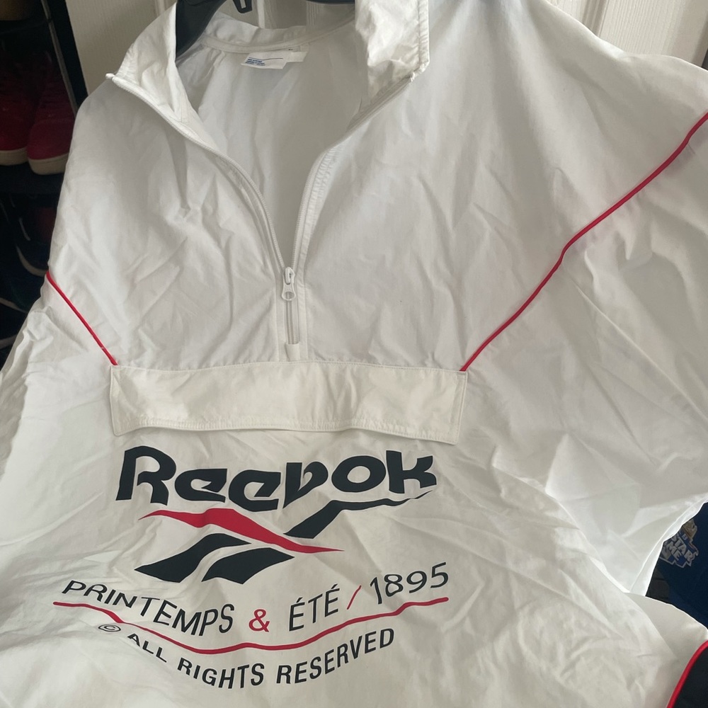 Men’s Reebok wind/rain gear.